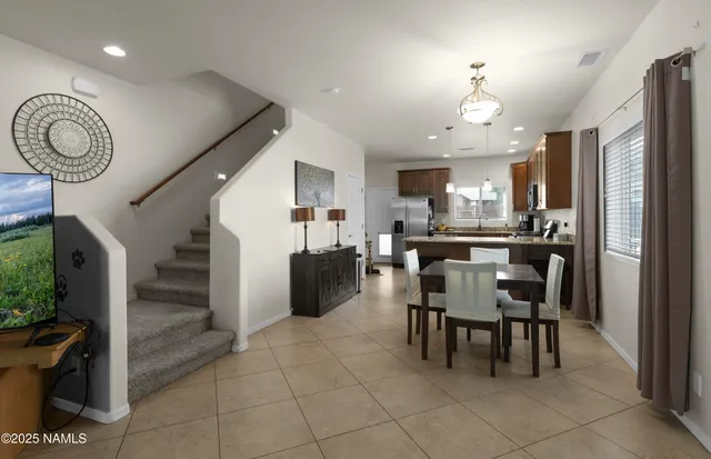 a view of a dining room kitchen and a window
