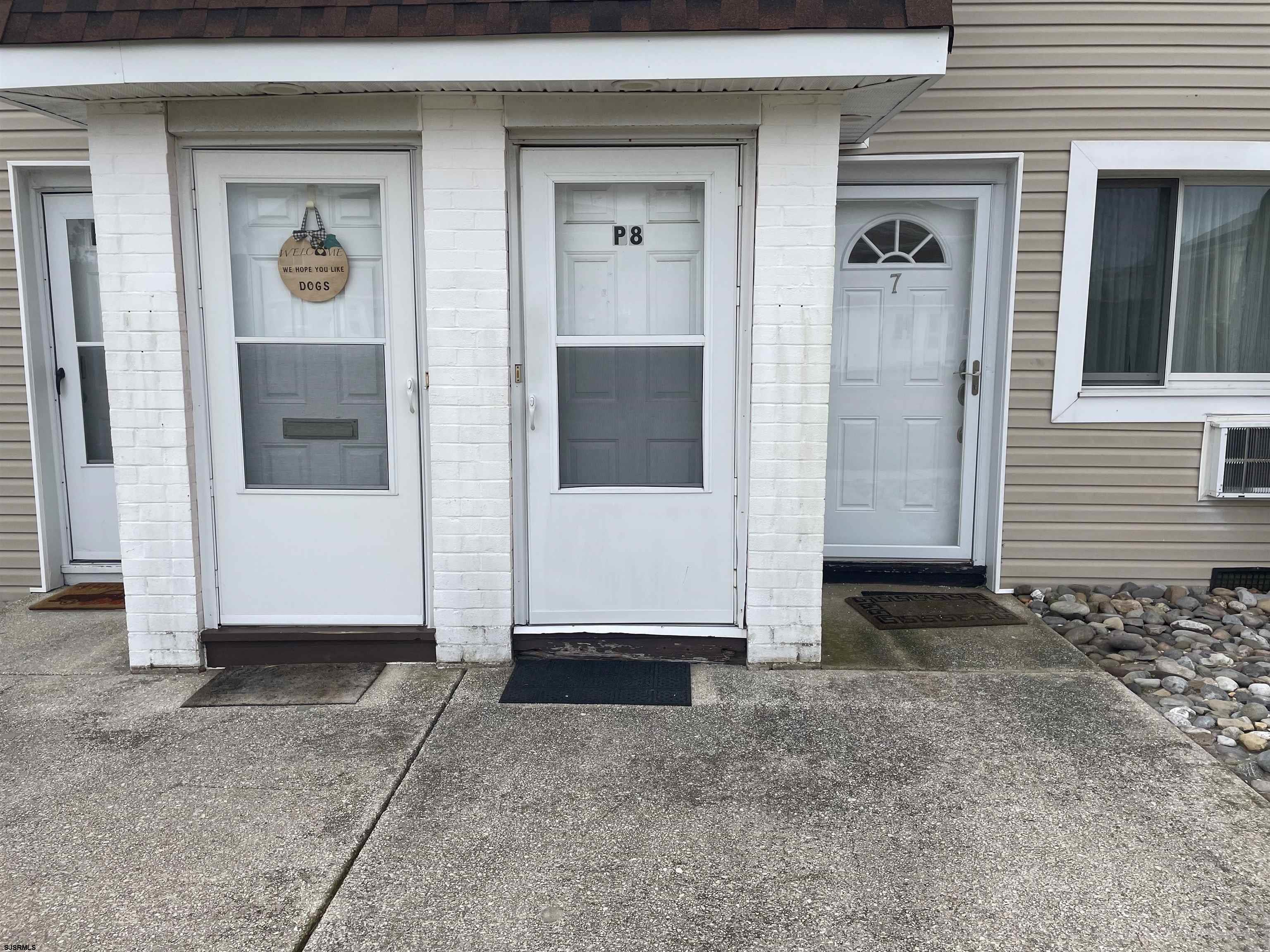 4901 Harbor Beach Boulevard, Unit P8 Brigantine, NJ 08203 - Photo 14 of 39 a view of front door of house
