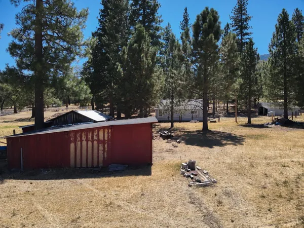 a view of snow on the side of the road