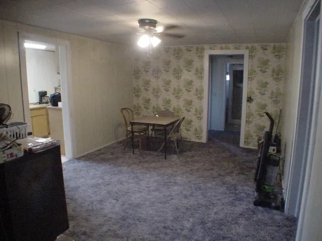 a room with furniture and a chandelier