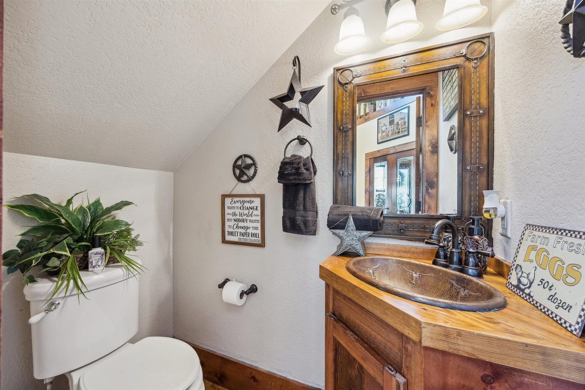 40570 Wildlife Run Hempstead, TX 77445 - Photo 19 of 43 a bathroom with a sink a toilet and a mirror