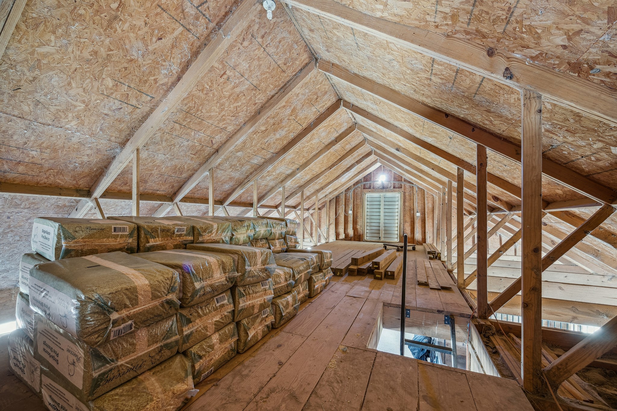 40570 Wildlife Run Hempstead, TX 77445 - Photo 41 of 43 Designed with equestrian practicality in mind, the spacious hay loft provides generous storage for feed, shavings, and tack keeping your supplies protected and ready to go. Accessible from the main barn, it supports efficient care routines and adds exceptional functionality to the horse facilities on site. Built for serious horse operations and everyday ease.