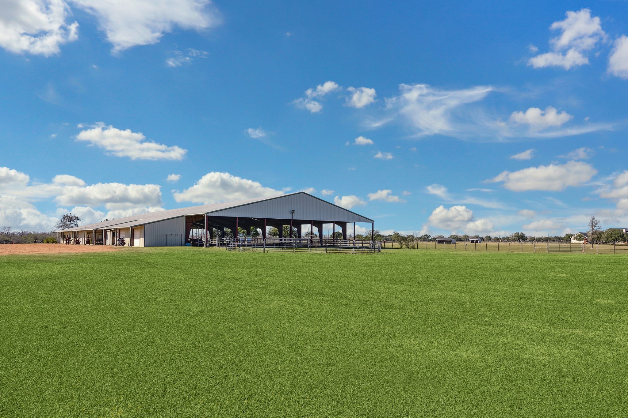 40570 Wildlife Run Hempstead, TX 77445 - Photo 42 of 43 An incredible highlight of this property, the massive covered riding arena offers exclusive use for the owner. Whether you’re a trainer, competitor, or hobby rider, this feature allows you to work horses any time of year, in any weather. Rarely found in private listings, this arena is a standout community amenity that elevates the entire ranch.