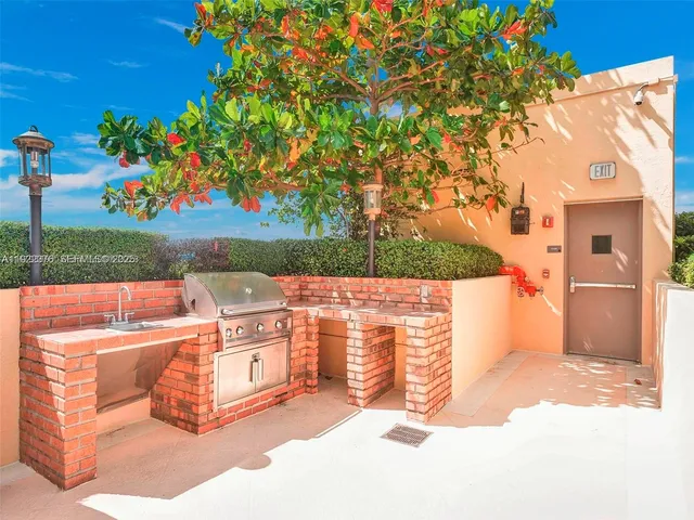 a view of a sign in front of house