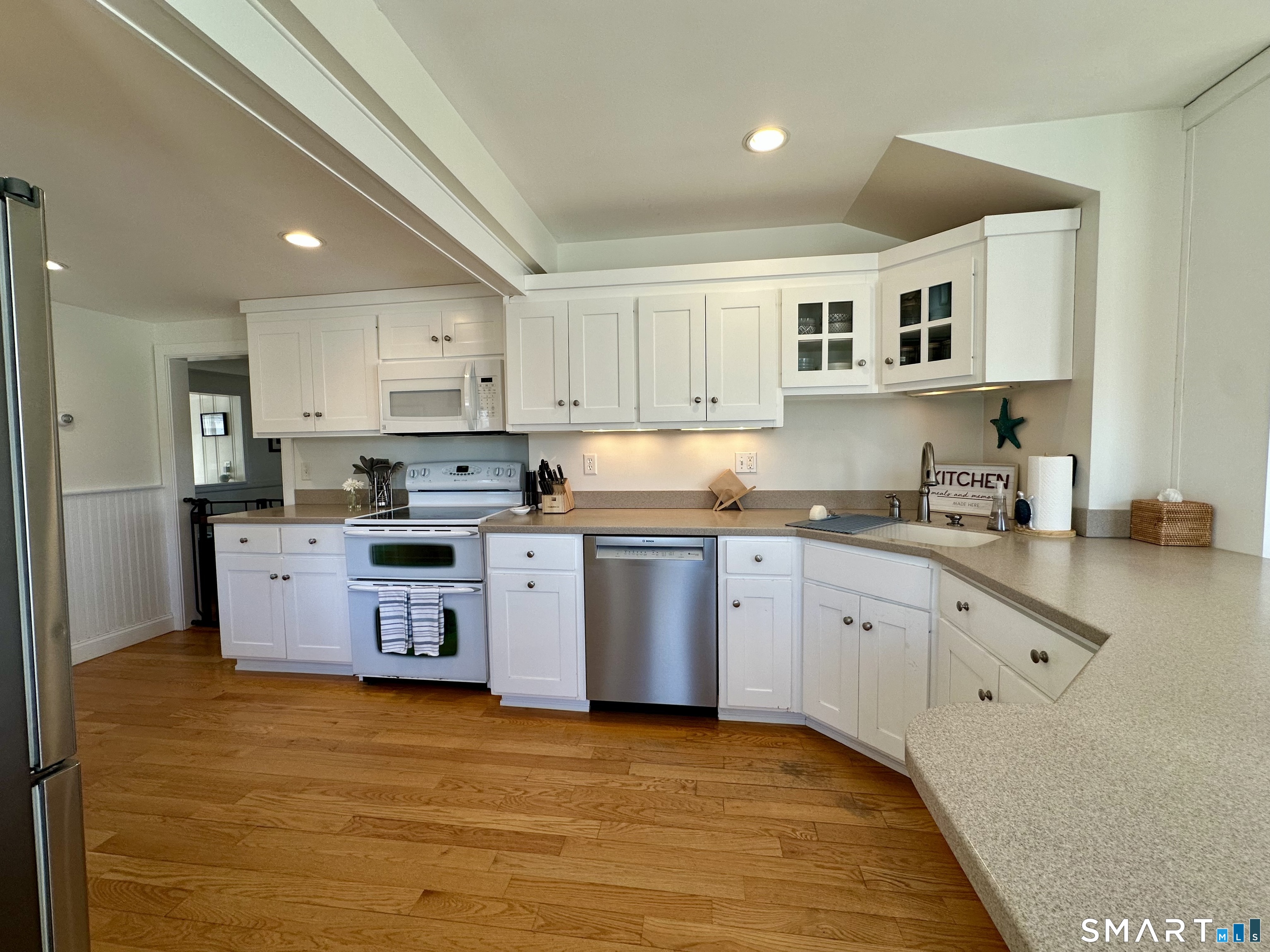 36 Attawan Road East Lyme, CT 06357 - Photo 7 of 40 Kitchen is off Dining Room. Side door Entrance from Enclosed Porch comes into the Kitchen.