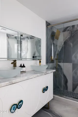 a kitchen with a sink and a refrigerator