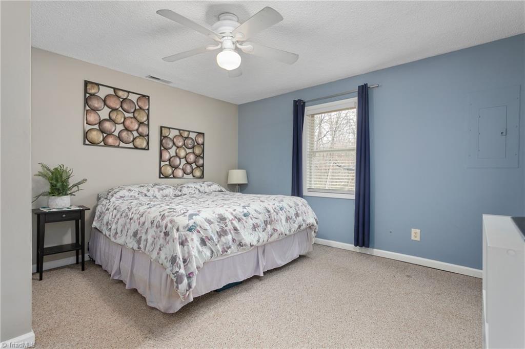 4306 Edgemore Road Greensboro, NC 27455 - Photo 13 of 26 Oversized primary bedroom