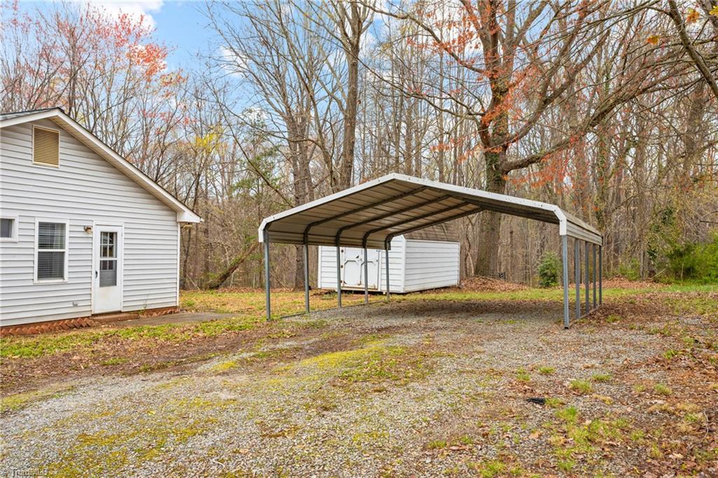 4306 Edgemore Road Greensboro, NC 27455 - Photo 22 of 26 2 car detached carport