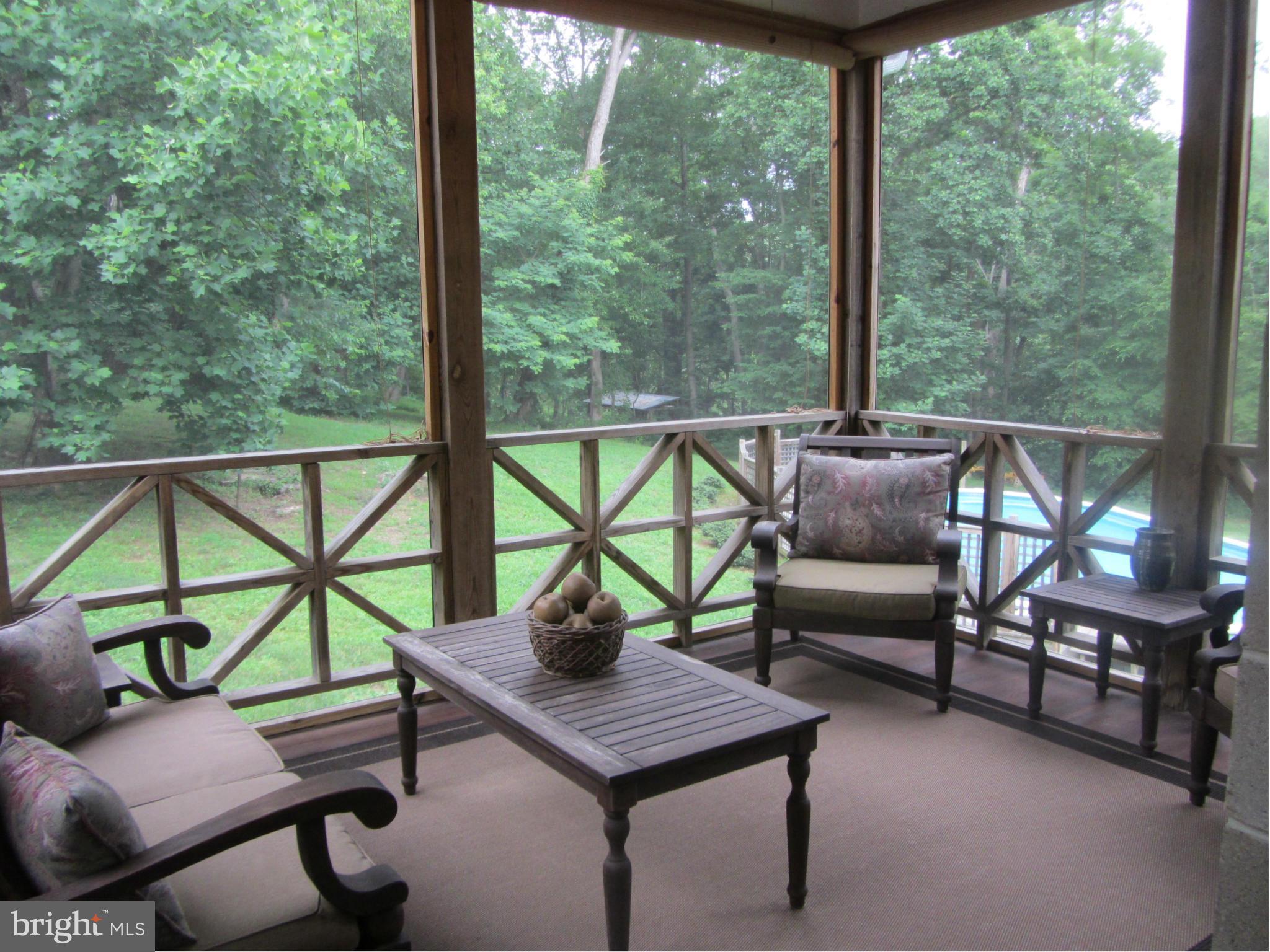 26609 Dutchtown Road Still Pond, MD 21667 - Photo 16 of 30 Screened Porch w/ Teak Flooring