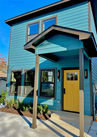 a front view of a house with a porch