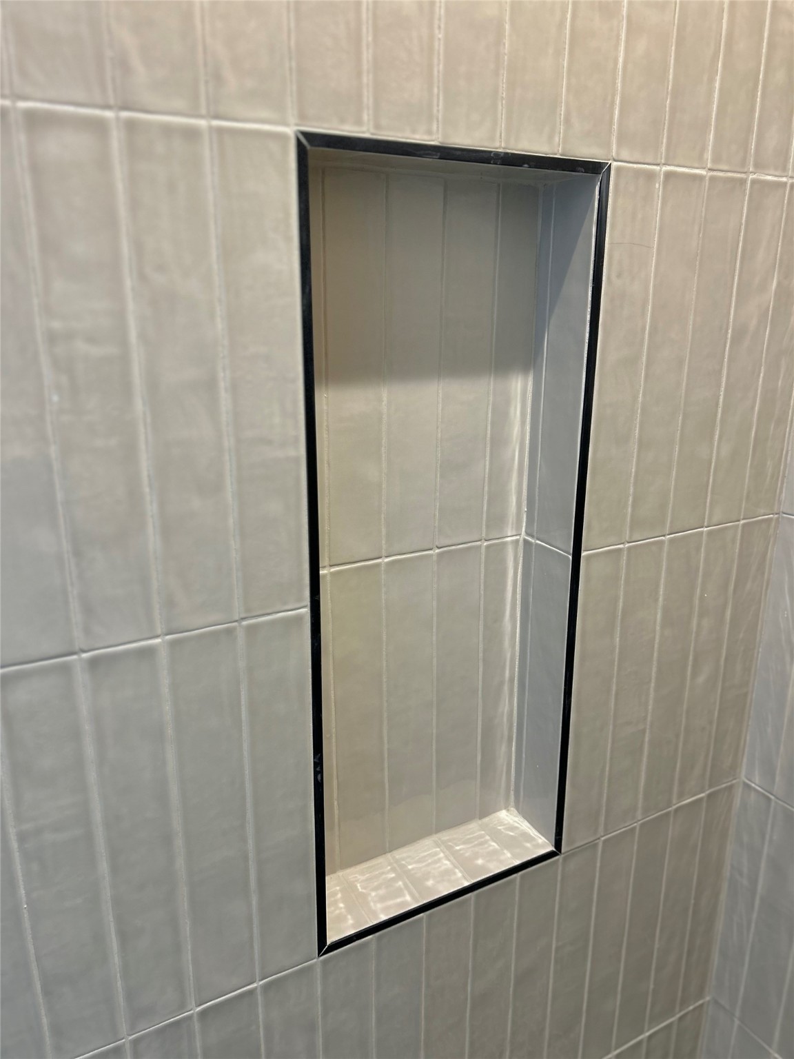 125 4th Street San Leon, TX 77539 - Photo 22 of 40 a bathroom with a glass shower door