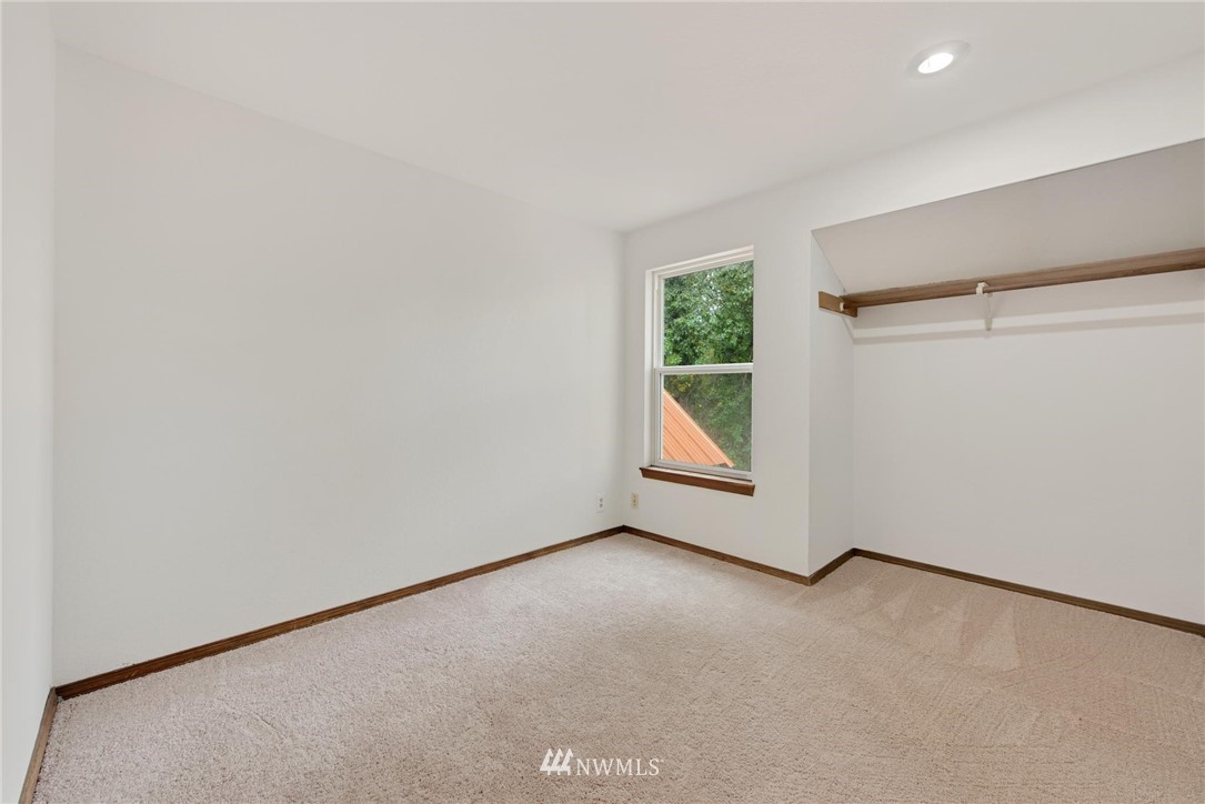 1230 224th Place Southwest Bothell, WA 98021 - Photo 14 of 22 an empty room with windows