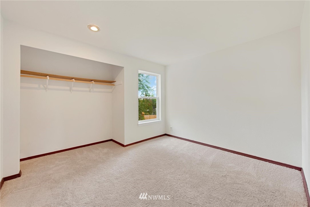 1230 224th Place Southwest Bothell, WA 98021 - Photo 15 of 22 an empty room with windows