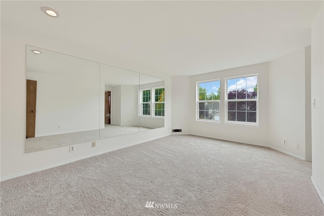 1230 224th Place Southwest Bothell, WA 98021 - Photo 16 of 22 an empty room with windows