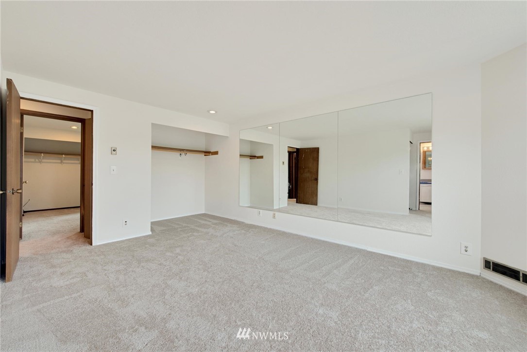 1230 224th Place Southwest Bothell, WA 98021 - Photo 17 of 22 an empty room with a empty space and windows