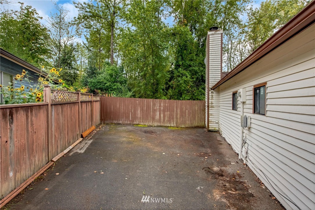 1230 224th Place Southwest Bothell, WA 98021 - Photo 22 of 22 a view of a back yard of the house
