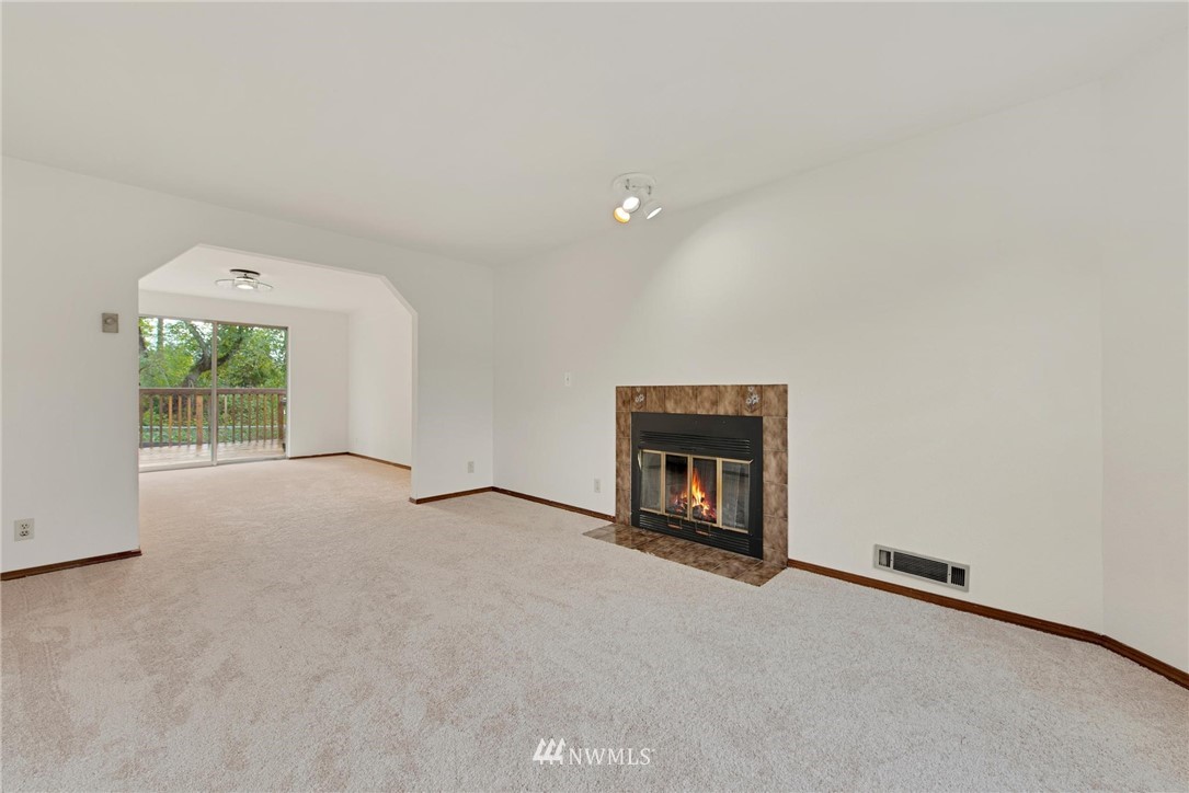 1230 224th Place Southwest Bothell, WA 98021 - Photo 4 of 22 an empty room with windows