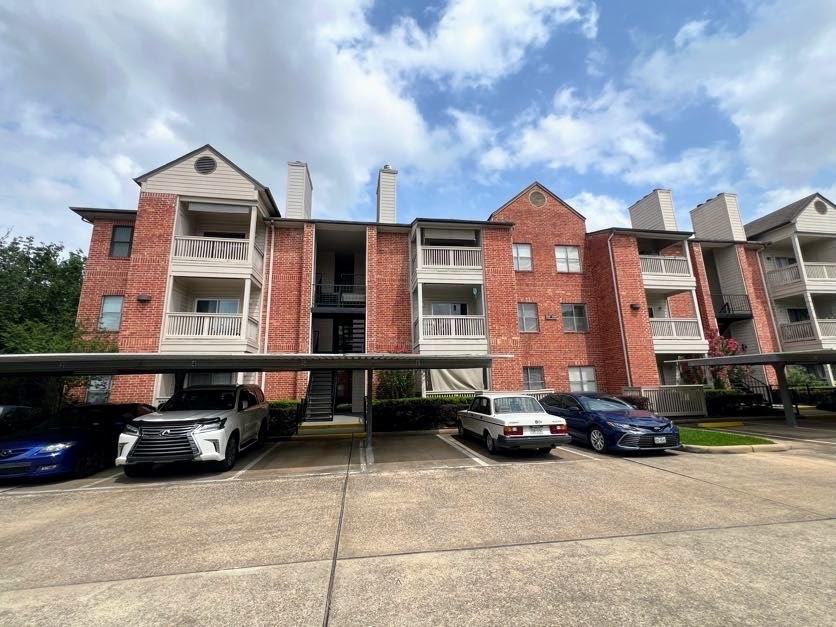 4041 Drake Street, Unit 118 Houston, TX 77005 - Photo 1 of 22 a car parked in front of a building