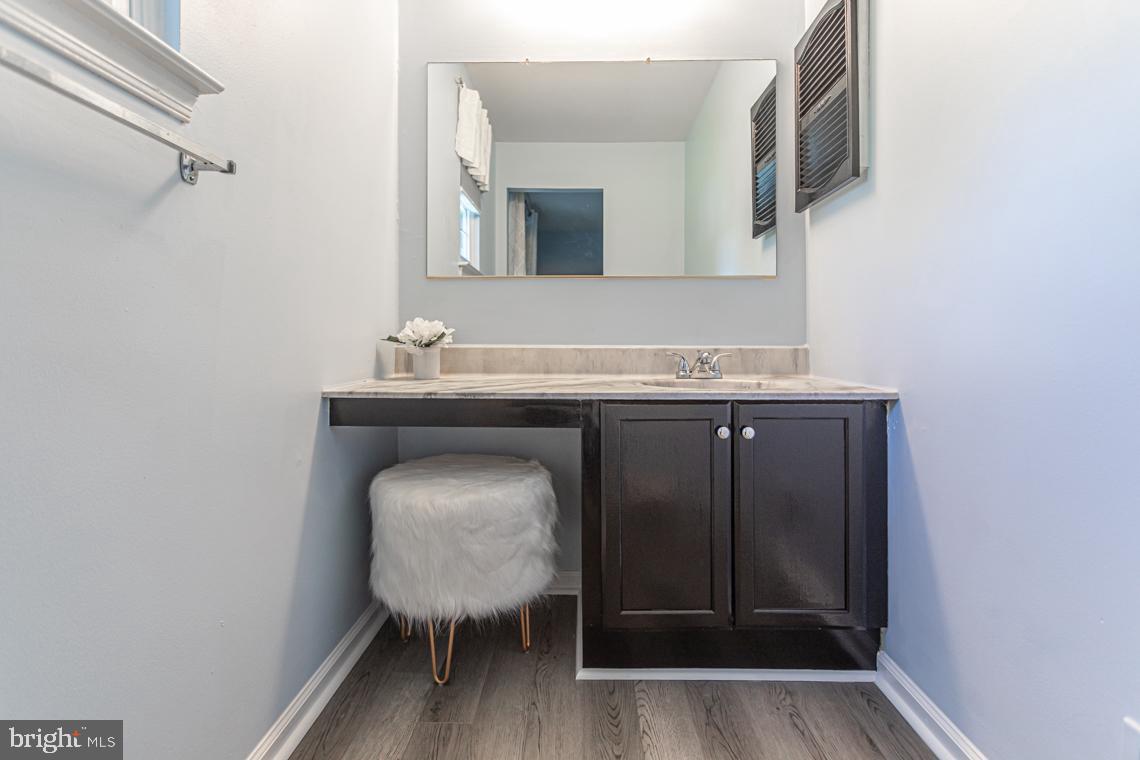 2064 Fort Bevon Road Harleysville, PA 19438 - Photo 15 of 25 a bathroom with a sink and a mirror