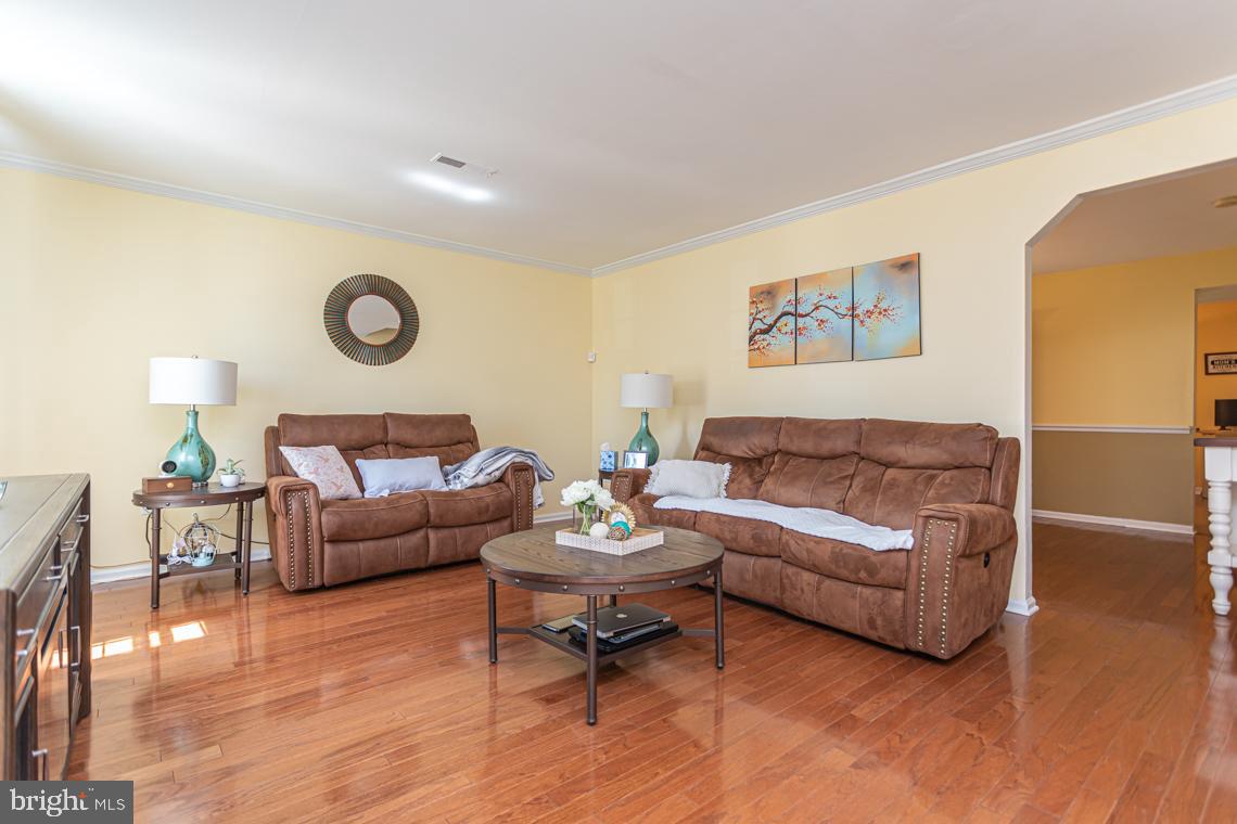2064 Fort Bevon Road Harleysville, PA 19438 - Photo 6 of 25 a living room with furniture and a wooden floor