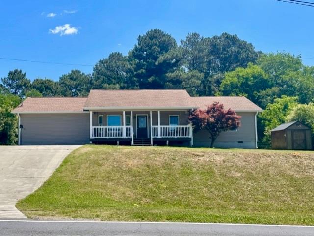 1706 Cash Road Southeast Calhoun, GA 30701 - Photo 1 of 1 a front view of a house with a yard