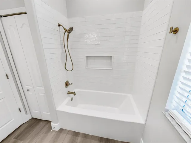 a bathroom with a bathtub