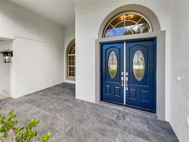 a view of hall way with mirror