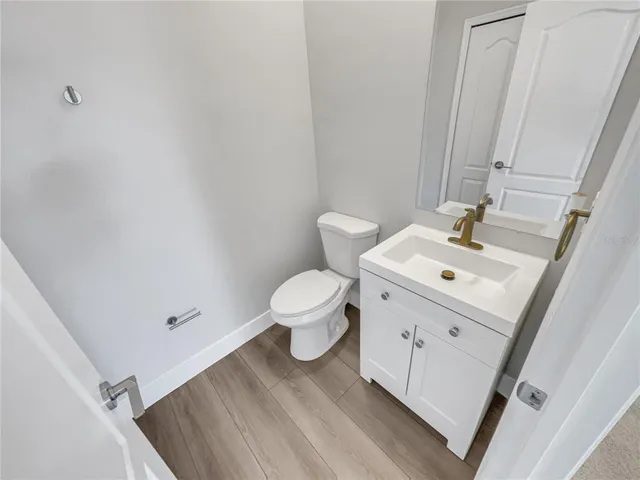 a bathroom with a sink toilet and tub