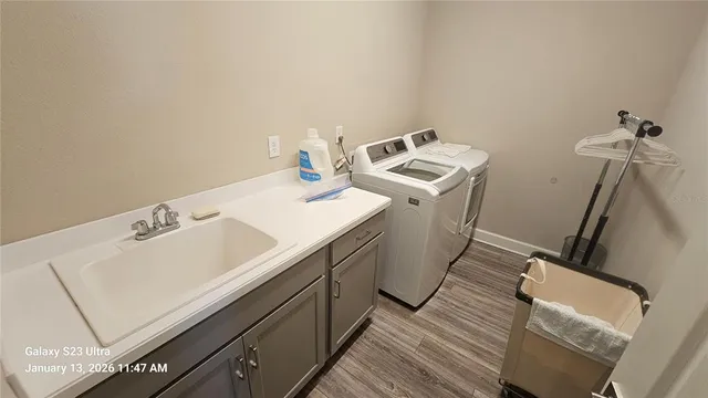 a utility room with dryer and washer