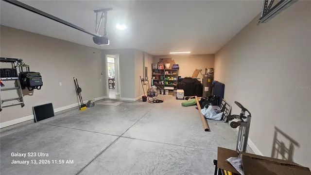 a view of a swimming pool with a table and chairs