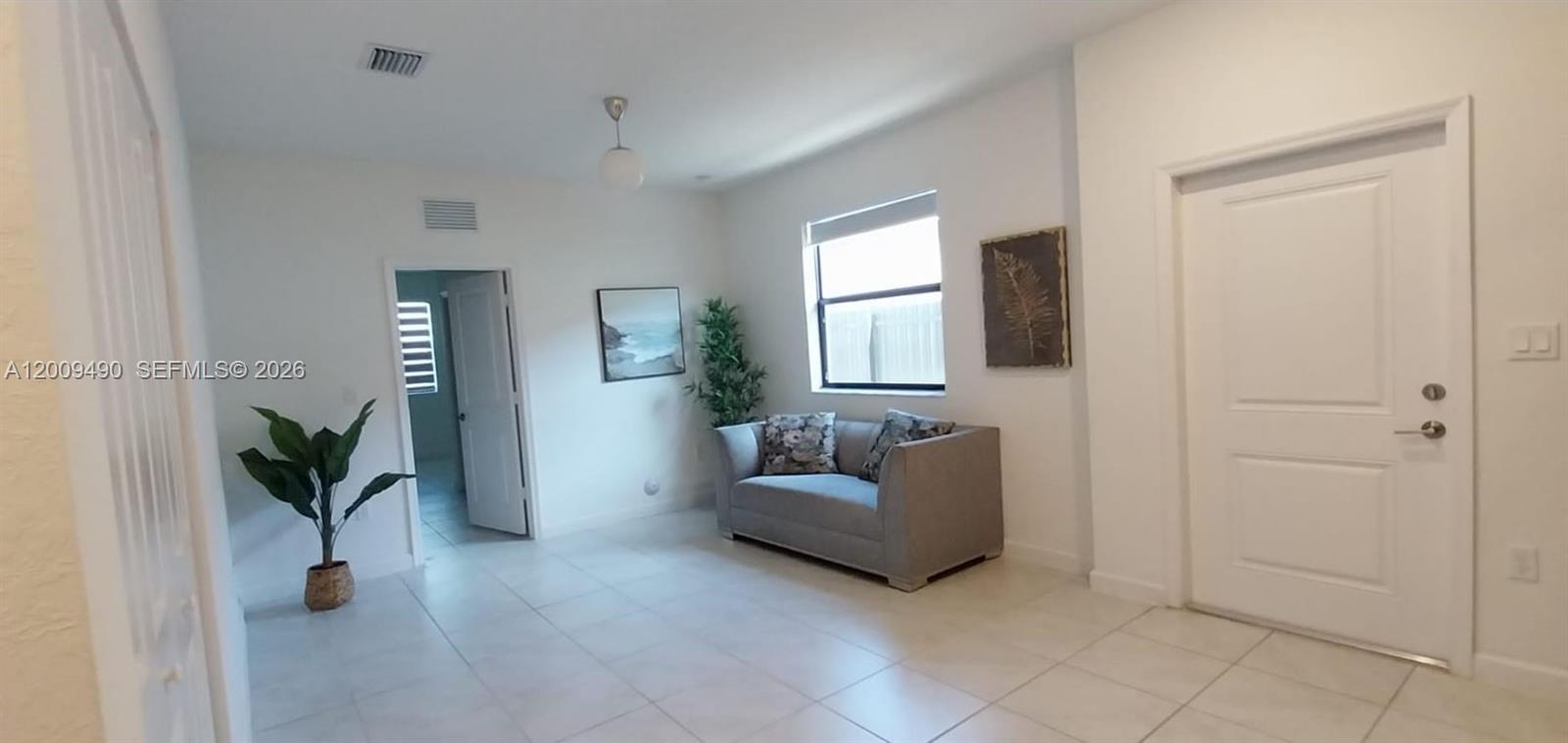 12975 Southwest 229th Lane, Unit 12975 Miami, FL 33170 - Photo 2 of 8 Living-dinning room