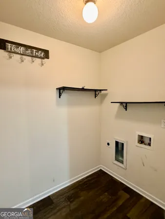 a bed room with furniture and window