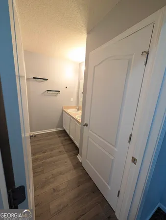 a spacious bedroom with a bed and a couch
