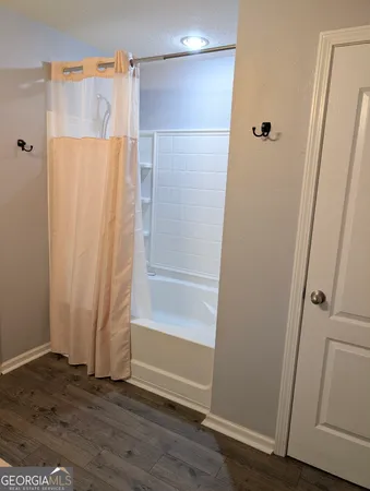 a bed room with a bed and a window