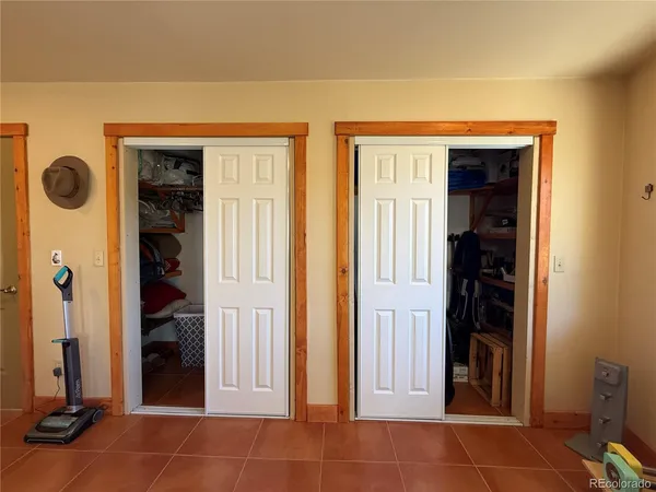 a bathroom with a toilet a sink and a mirror