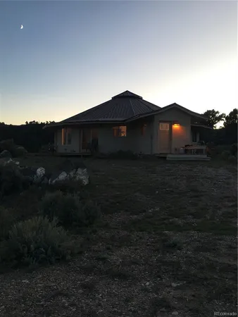 a view of a house with a mountain
