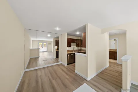 a view of kitchen with wooden floor