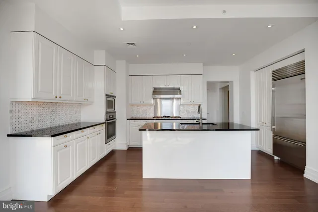 a view of roof with city view