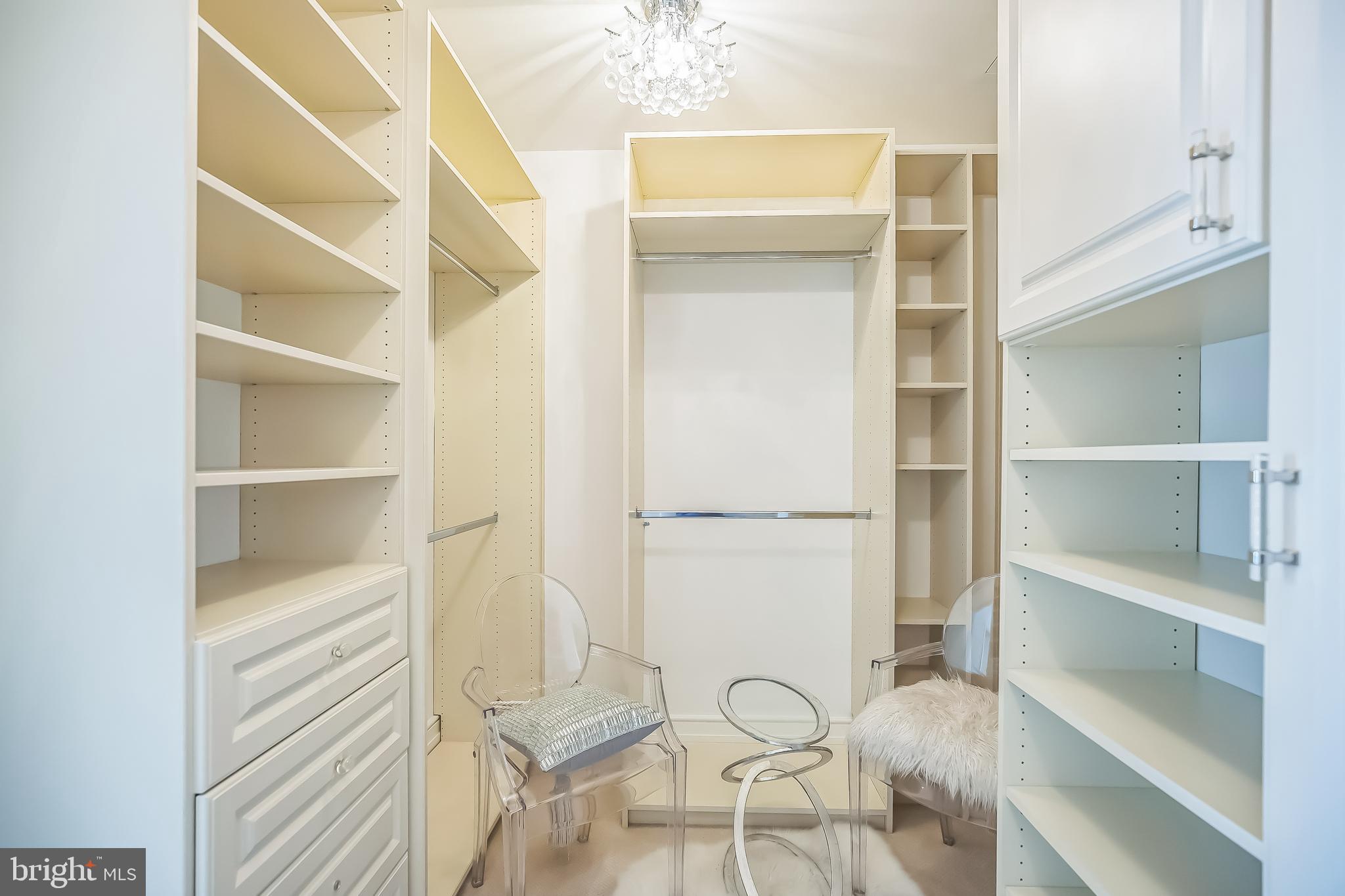 130 South 18th Street, Unit 2801 Philadelphia, PA 19103 - Photo 20 of 51 a view of a hallway with chandelier
