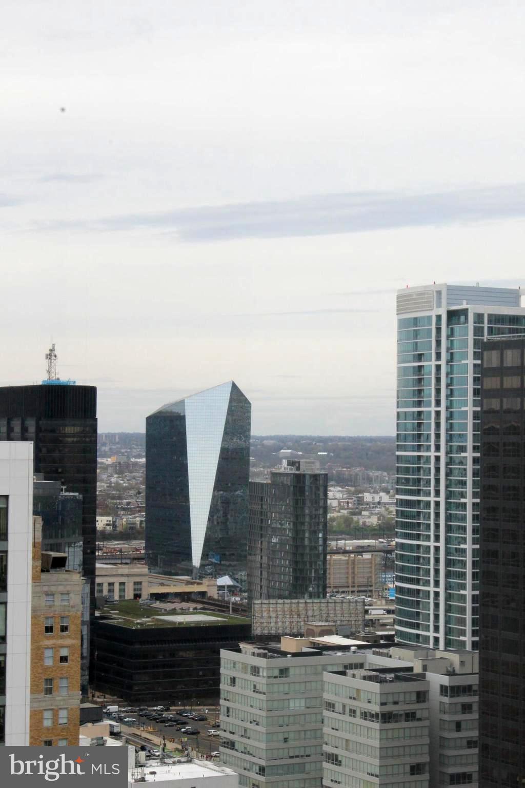130 South 18th Street, Unit 2801 Philadelphia, PA 19103 - Photo 26 of 51 a view of roof with city view