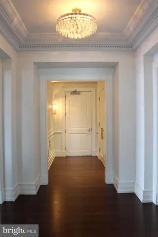 a kitchen with stainless steel appliances a sink and a refrigerator