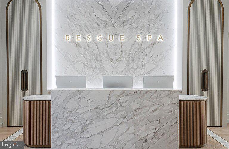 130 South 18th Street, Unit 2801 Philadelphia, PA 19103 - Photo 50 of 51 a bathroom with a granite countertop shower a mirror and vanity