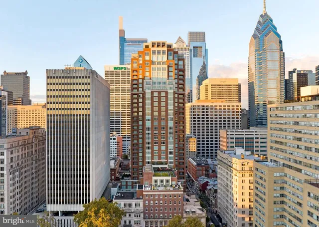 a bathroom with a bathtub and a sink