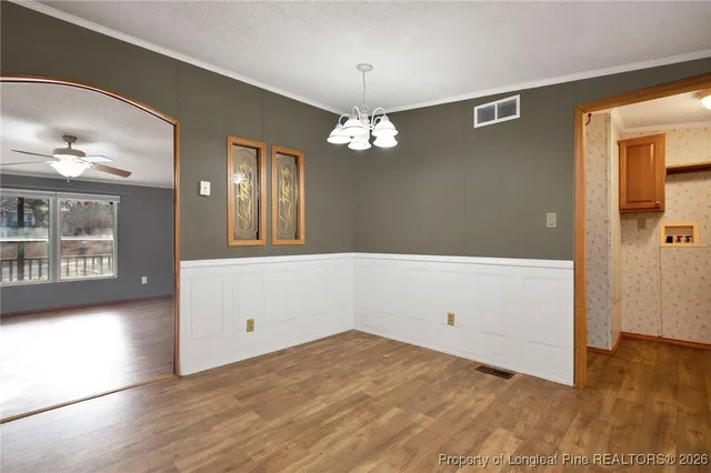 a bathroom with a sink a vanity and a mirror