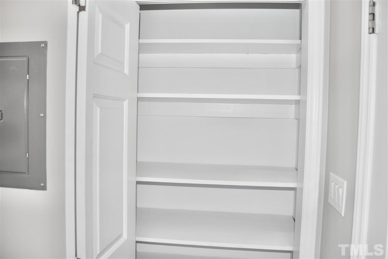 1625 Martin Pond Road Wendell, NC 27591 - Photo 12 of 30 Great pantry with wood shelves, with lots of storage