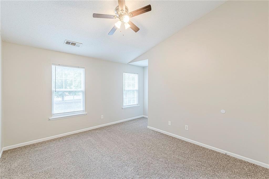 5850 Sable Glen Road Atlanta, GA 30349 - Photo 28 of 33 a view of an empty room with a window