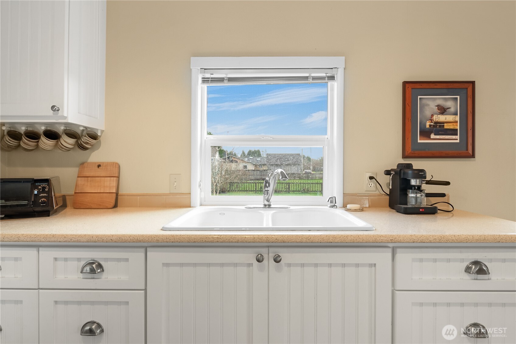 212 2nd Street Northeast Long Beach, WA 98631 - Photo 11 of 33 a sink with a potted plant on it