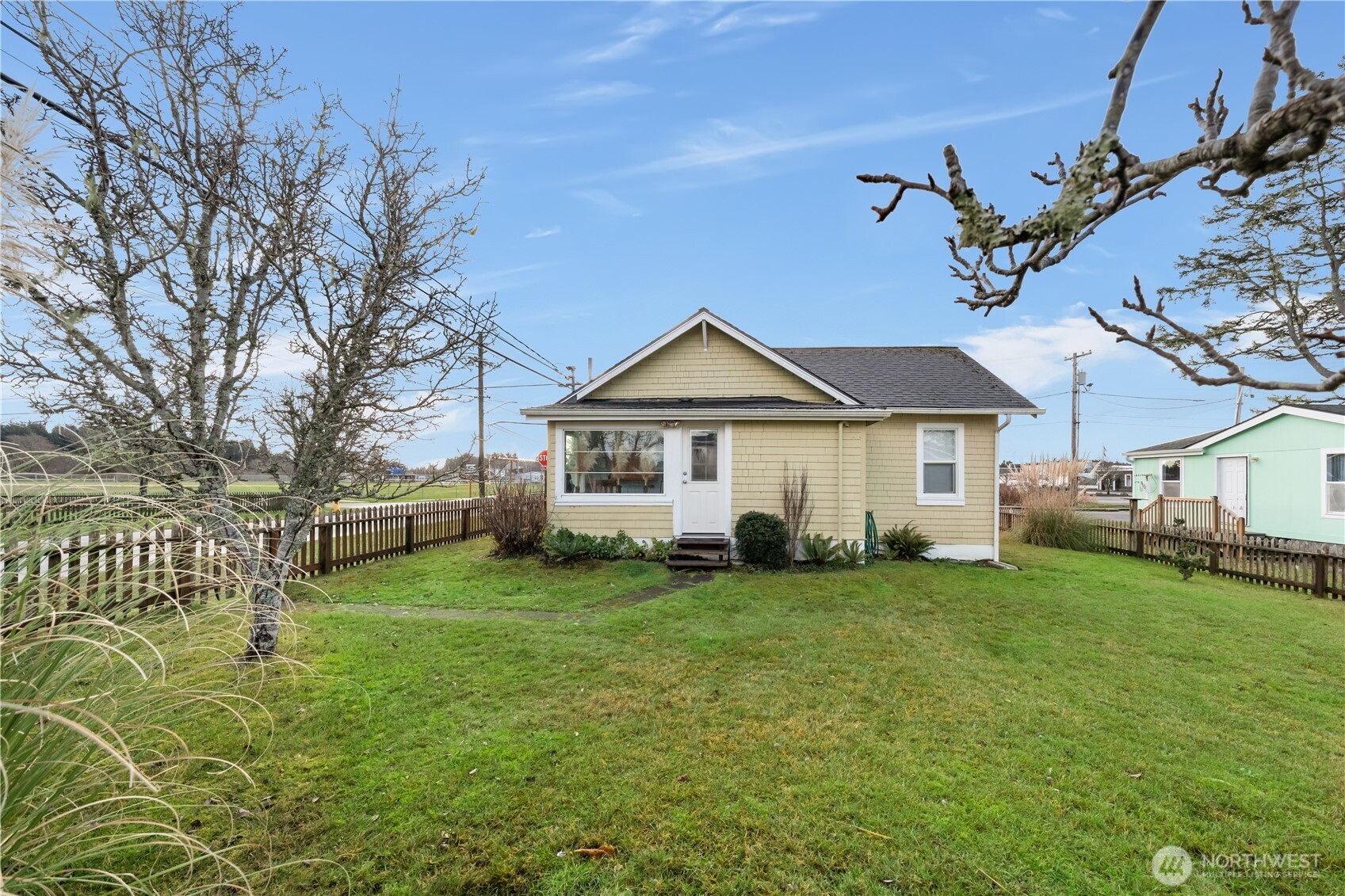 212 2nd Street Northeast Long Beach, WA 98631 - Photo 23 of 33 a view of a house with a yard