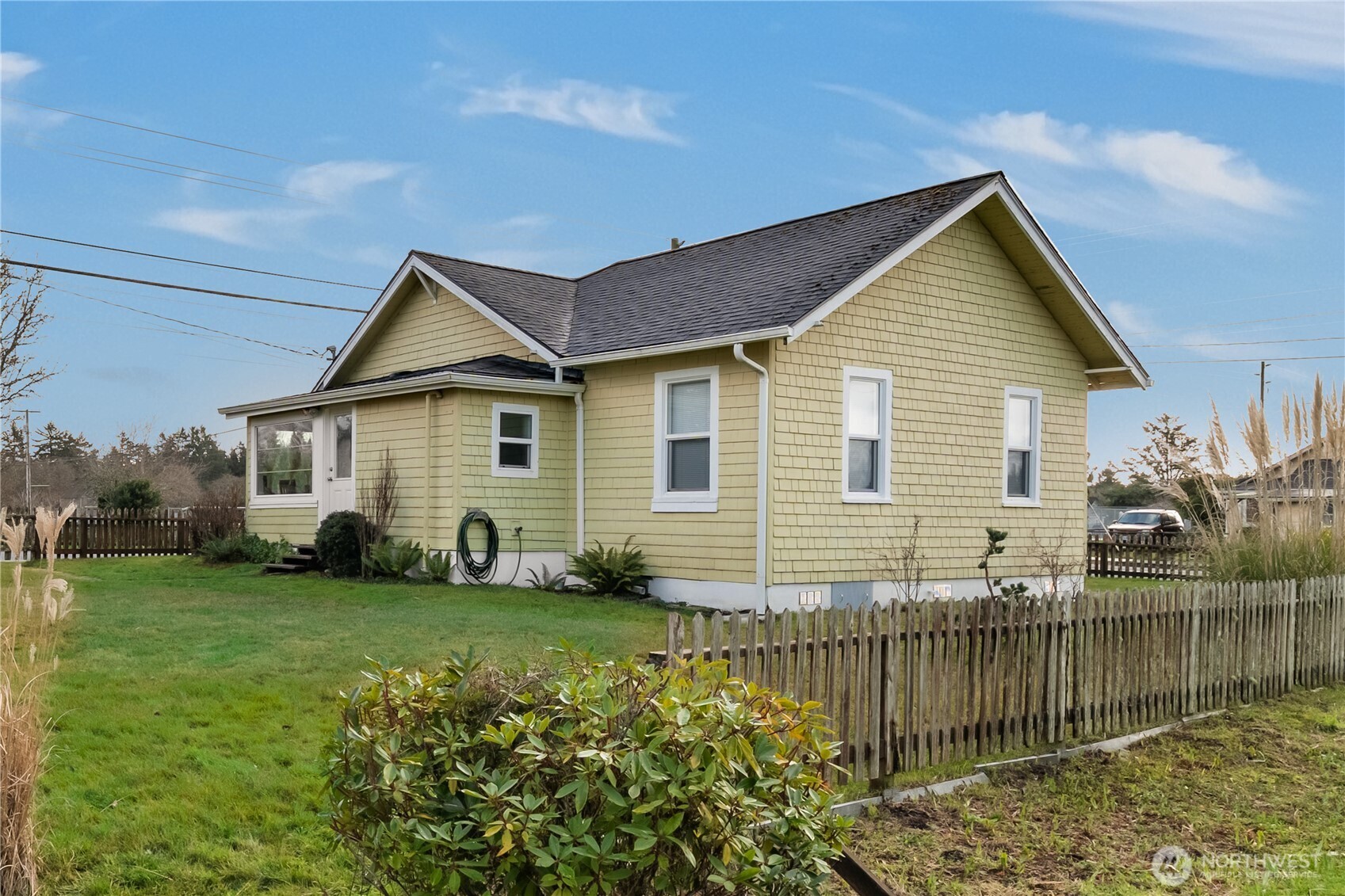 212 2nd Street Northeast Long Beach, WA 98631 - Photo 24 of 33 a view of a house with a yard