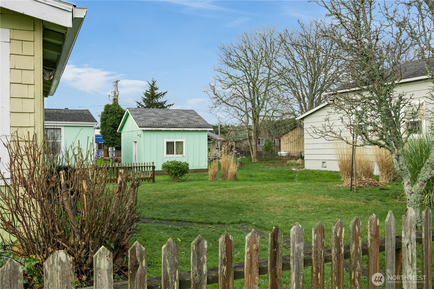 212 2nd Street Northeast Long Beach, WA 98631 - Photo 25 of 33 a front view of a house with a garden